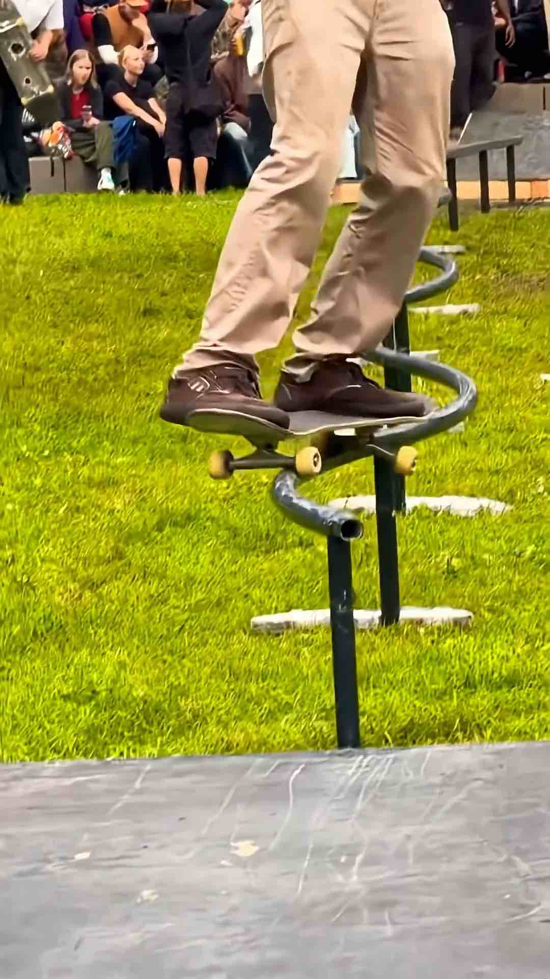 51 year old skater Pat Duffy does a 50-50 grind on a squiggly handrail