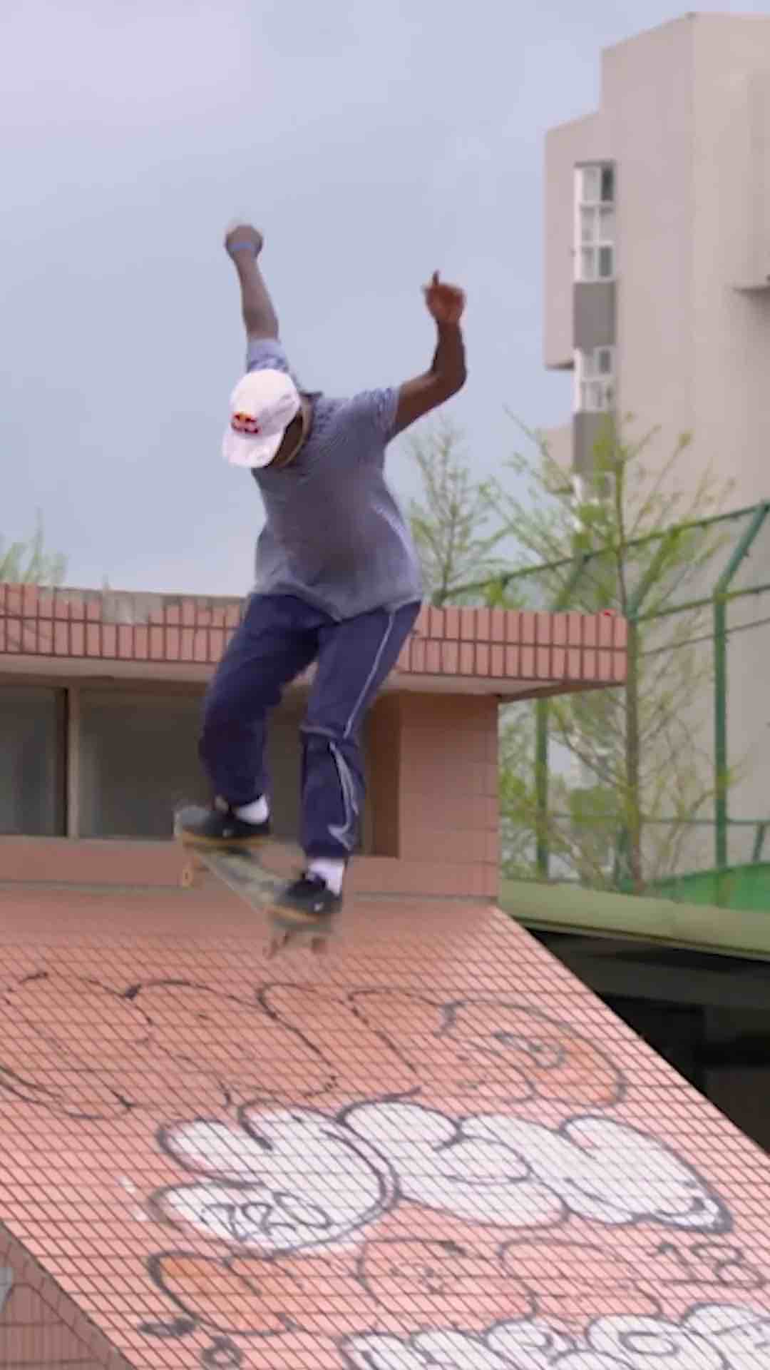 Zion Wright does nollie heelflip off roof